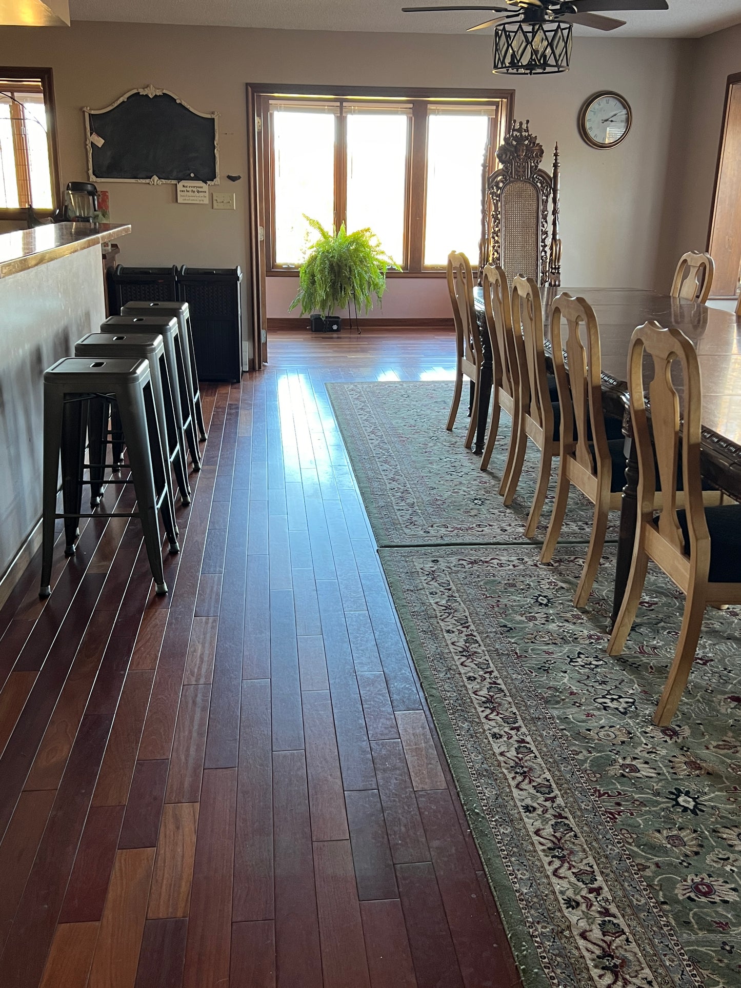 Modern interior design with wooden furniture and decorative elements.