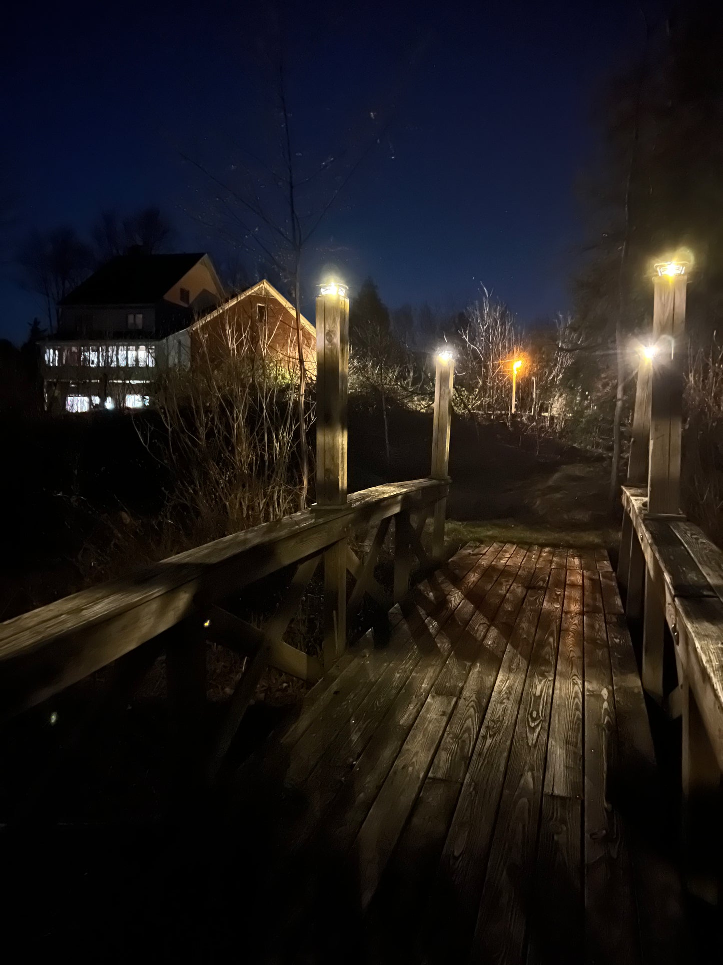 Lighted bridge at the start of the trails