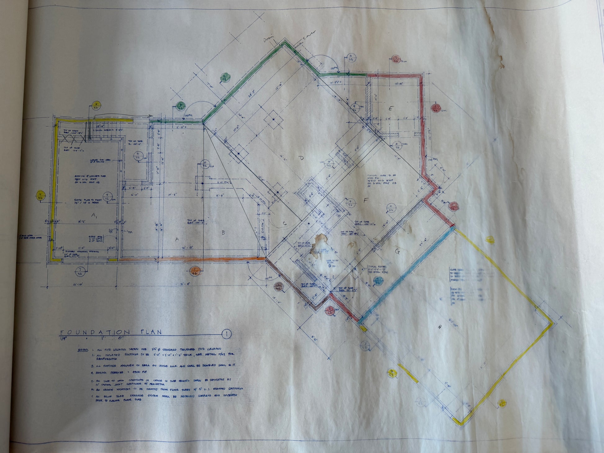 Blueprints on a white sheet of paper