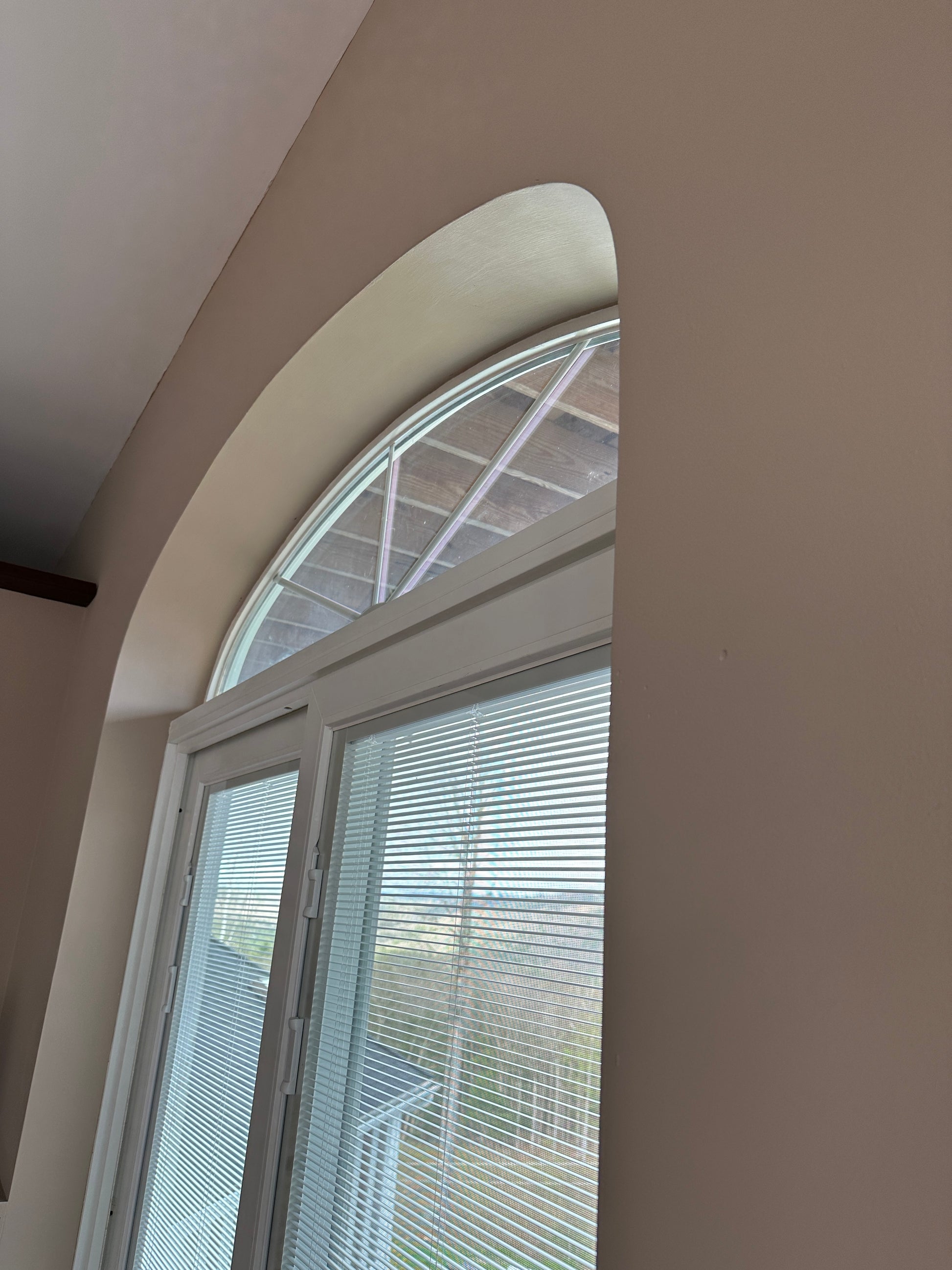 Round sliding glass door with  window on a curved ceiling