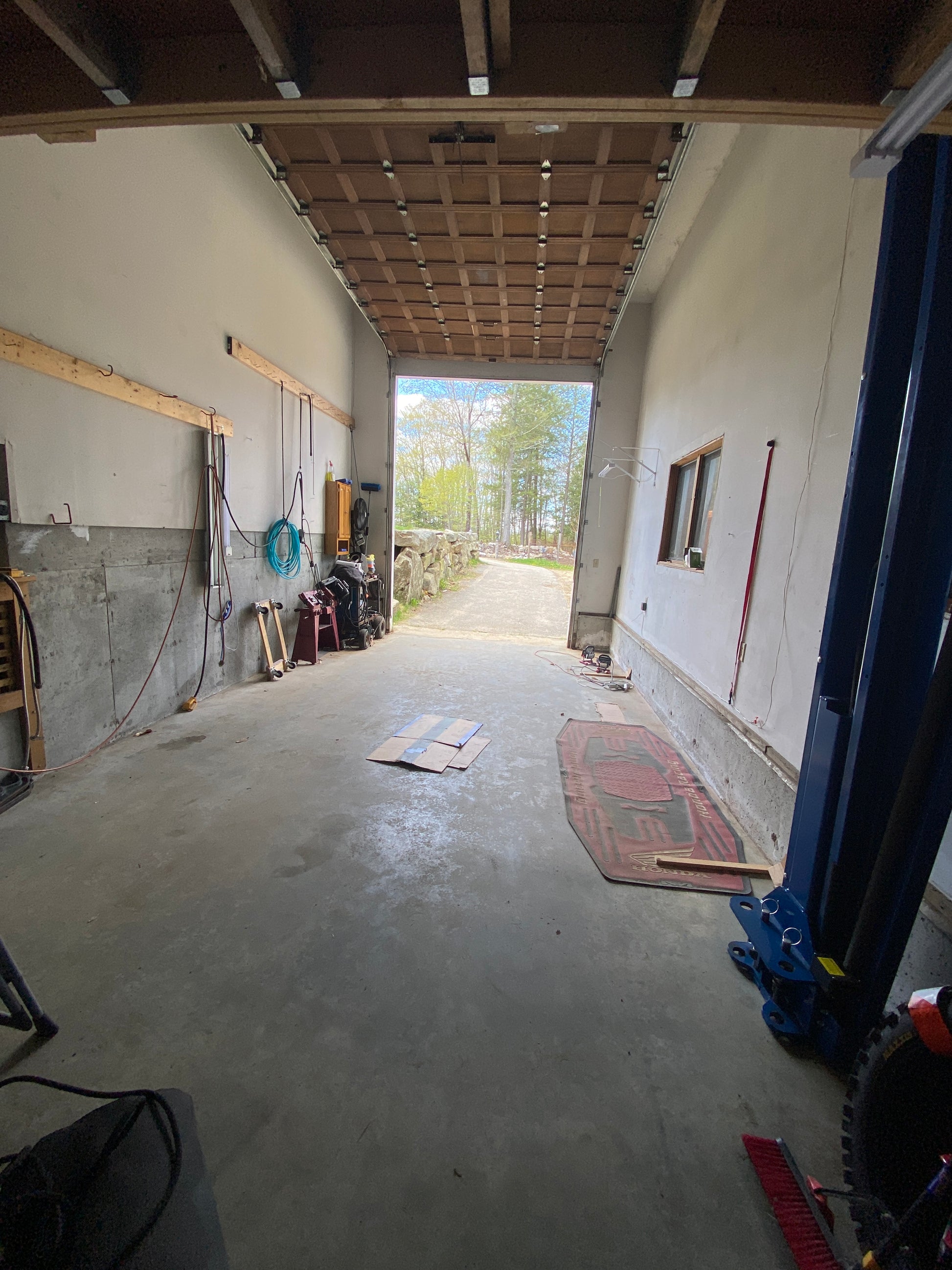 RV garage  interior with exposed ceiling and floor, showing a large open space.