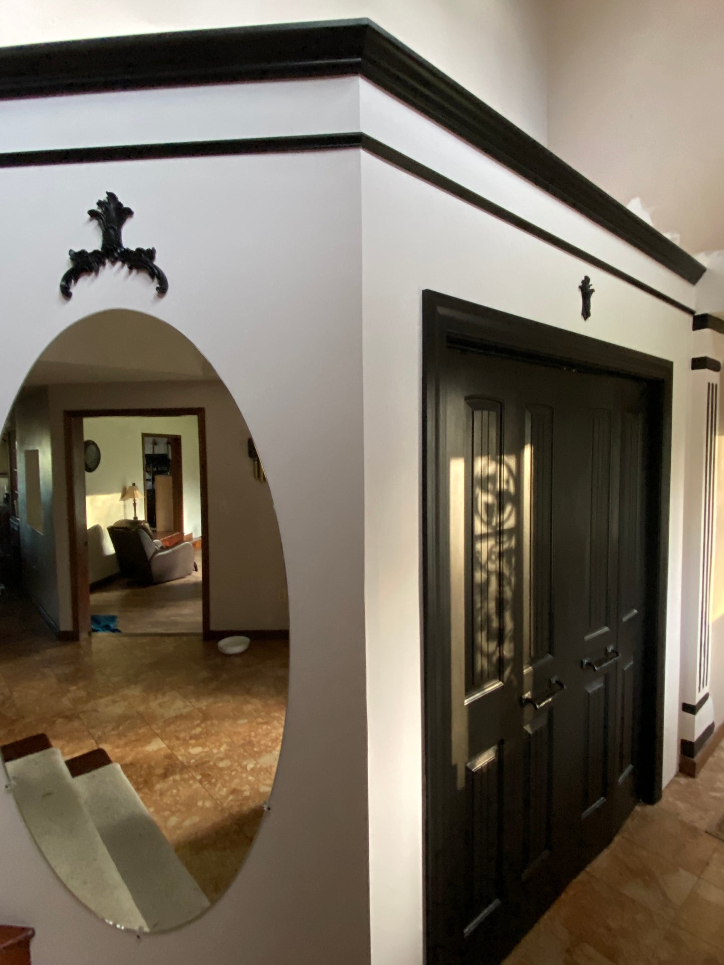 Coat closet fancy with mirror and columns 