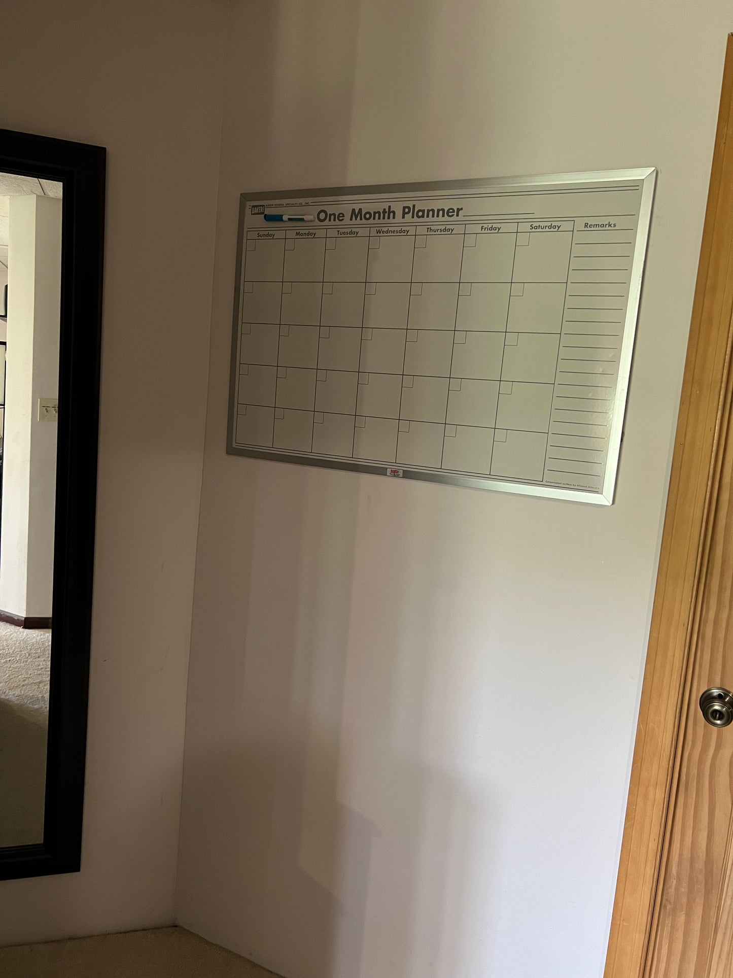 Monthly planner in the suite wooden border to mirror