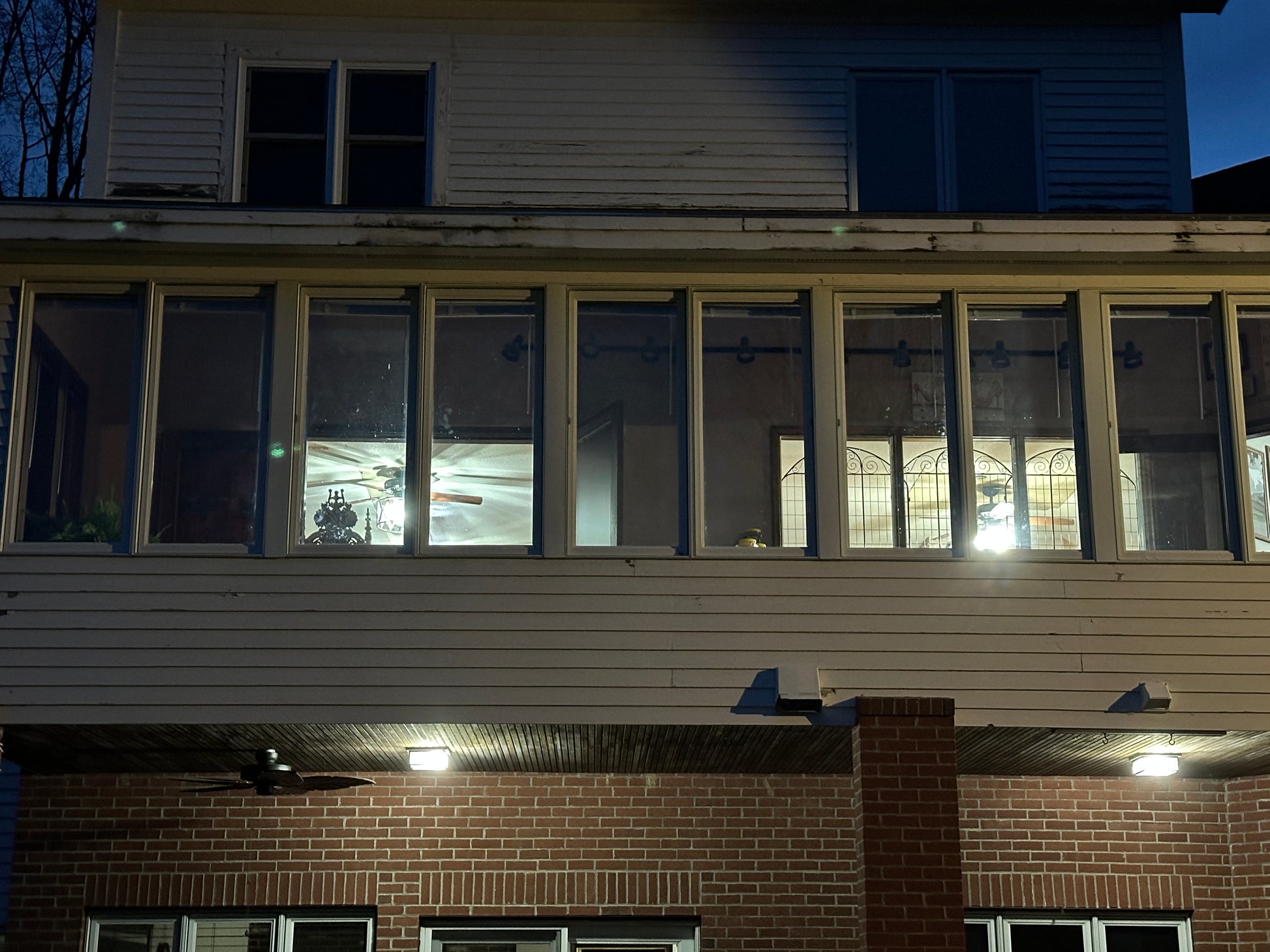 Building exterior with lit windows at night