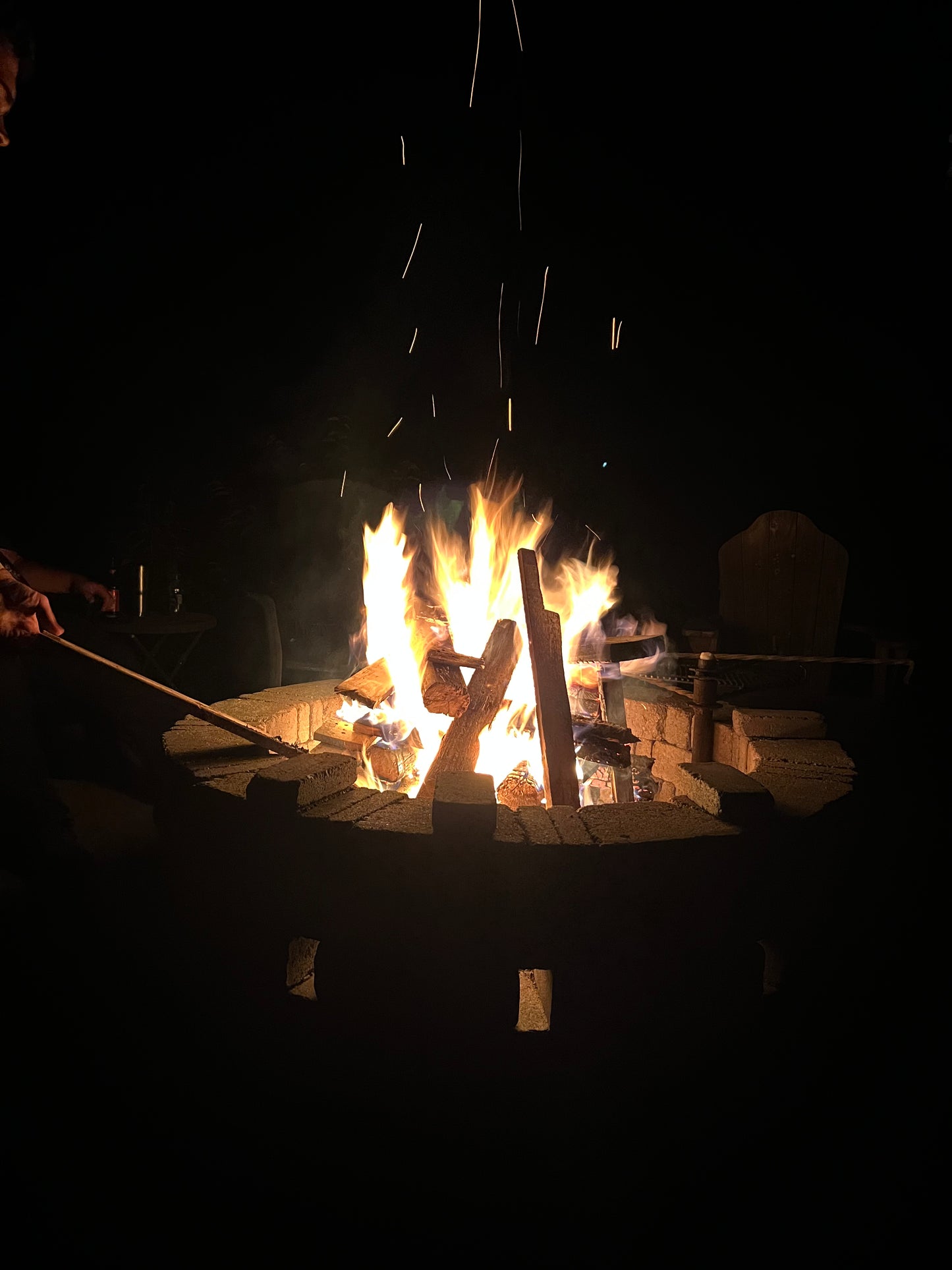 Fire pit with flames at night