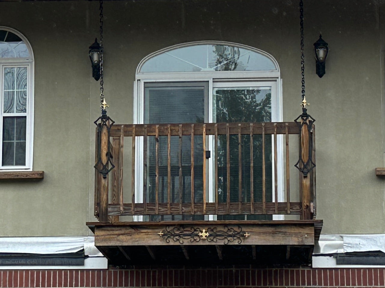 house with a draw bridge  balcony 