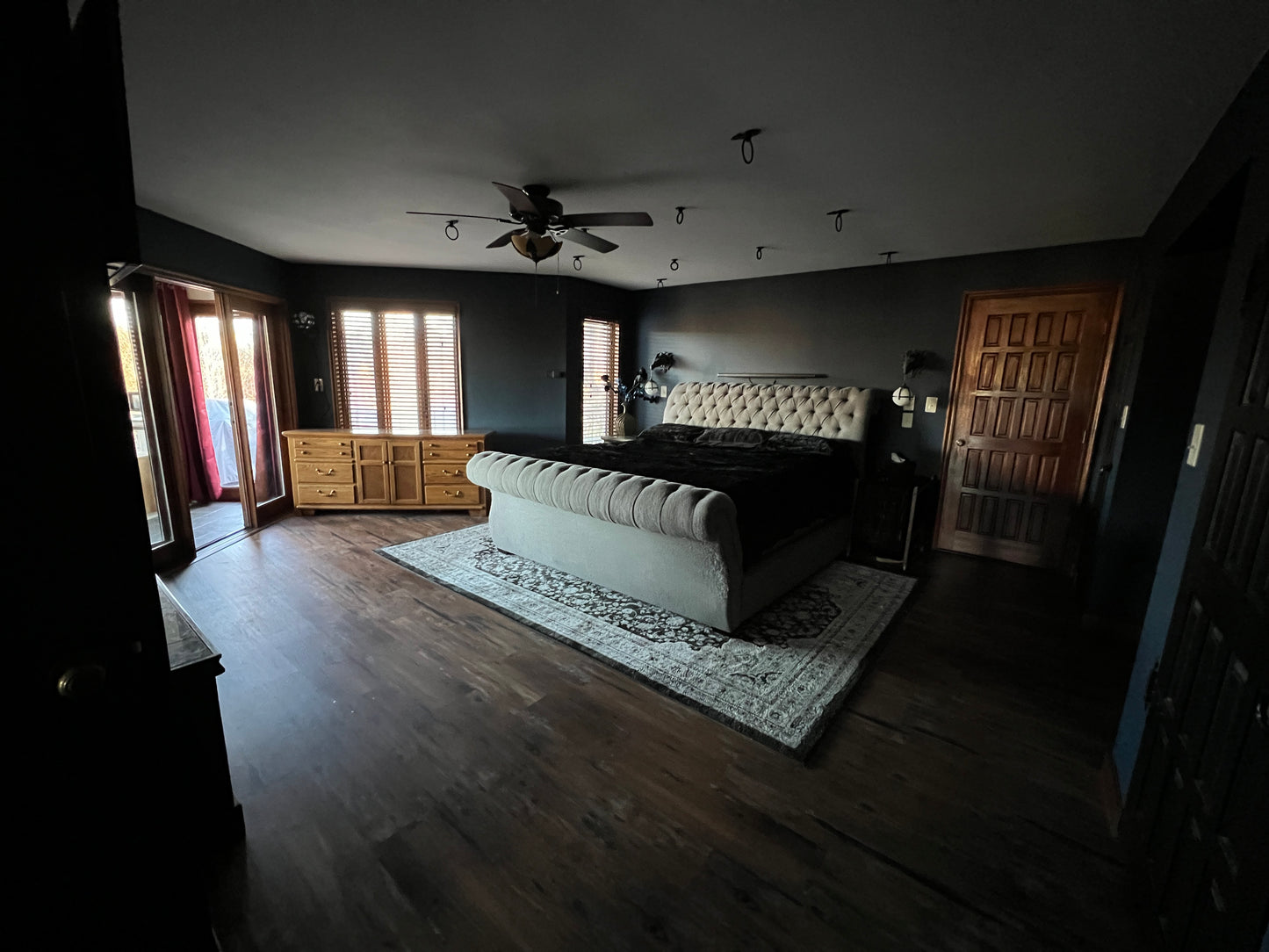 Master bedroom mahogany wood work new flooring canopy above bed