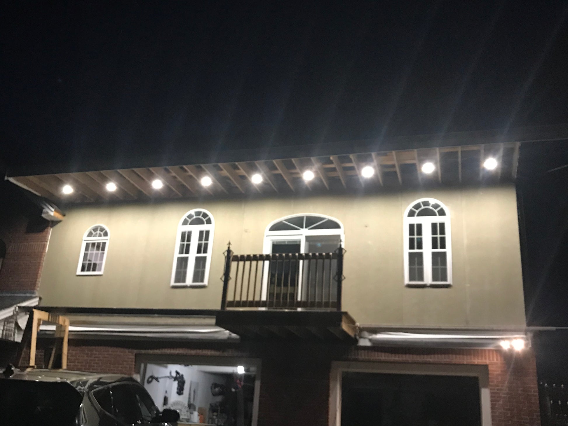 Building exterior with lights on at night