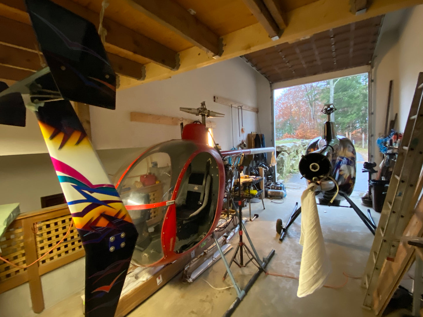 Helicopter parts and components in a workshop setting