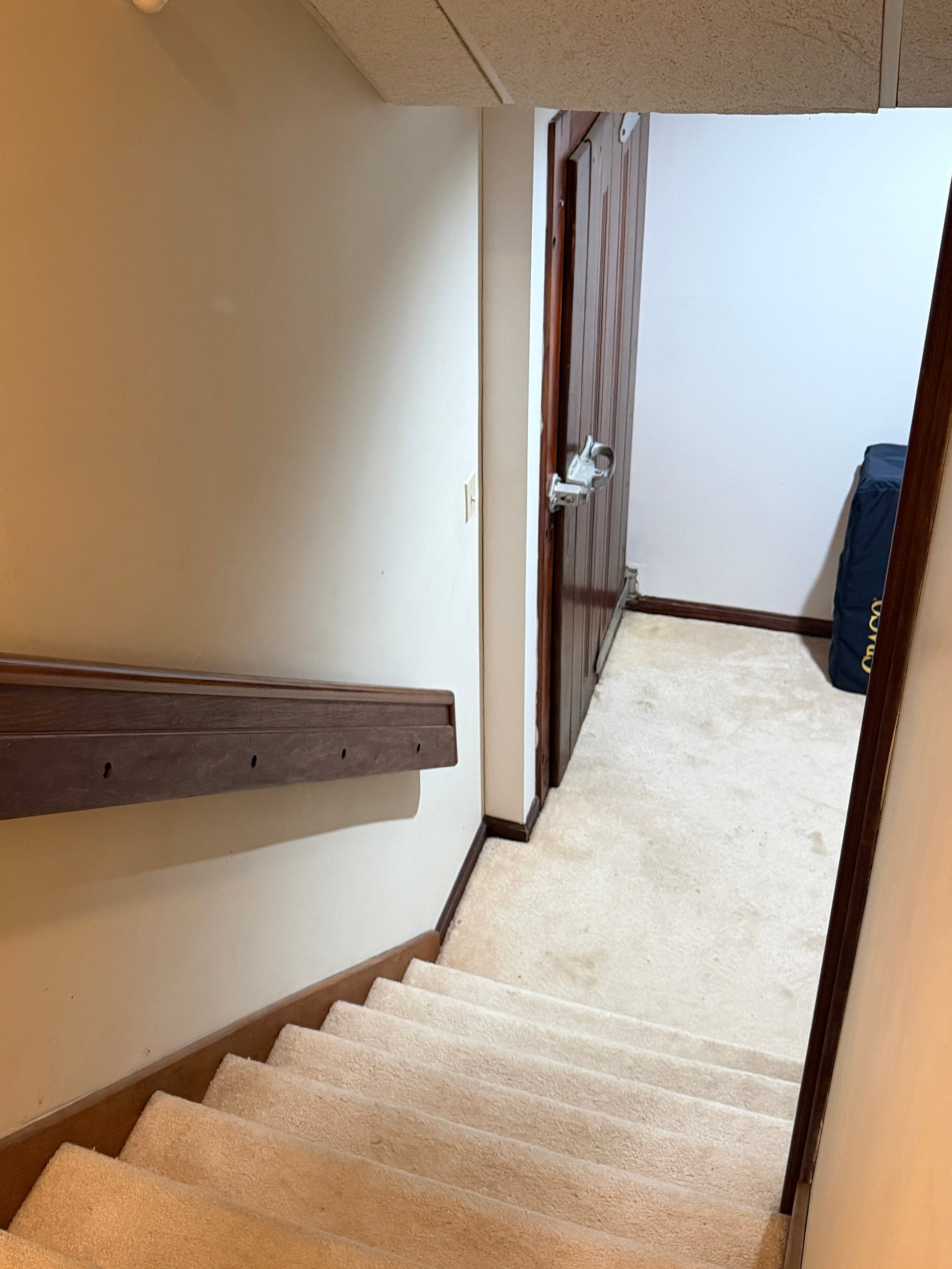 wooden door to the wine cellar downstairs