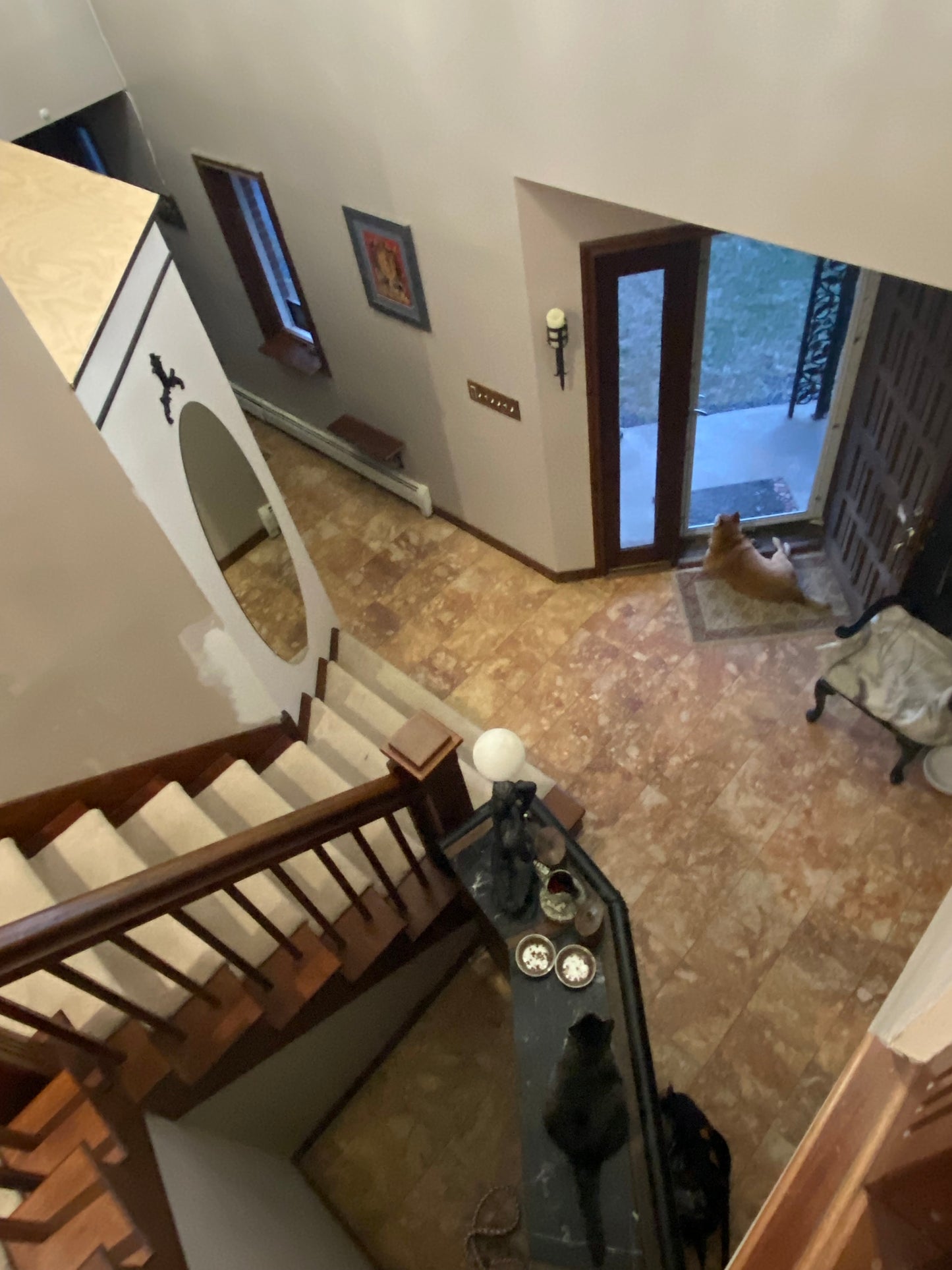 Staircase with a glass railing in a home interior