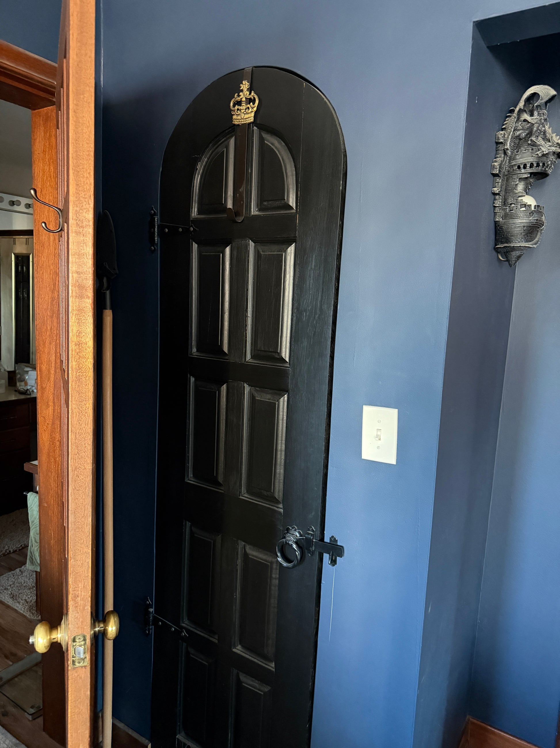 Jewelry closet on a blue surface with a wooden doors and mahogany door Nature View NH Estate