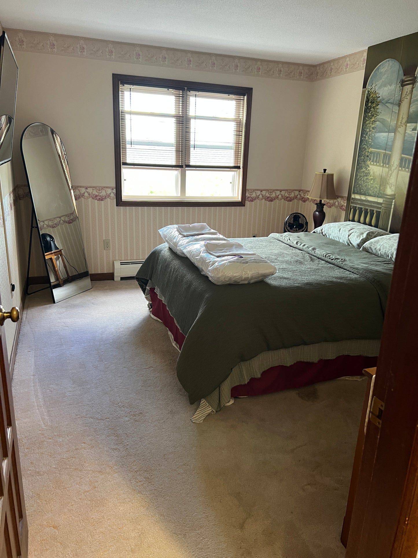 Bedroom with a bed, dresser, and window. Italy Theme bedroom