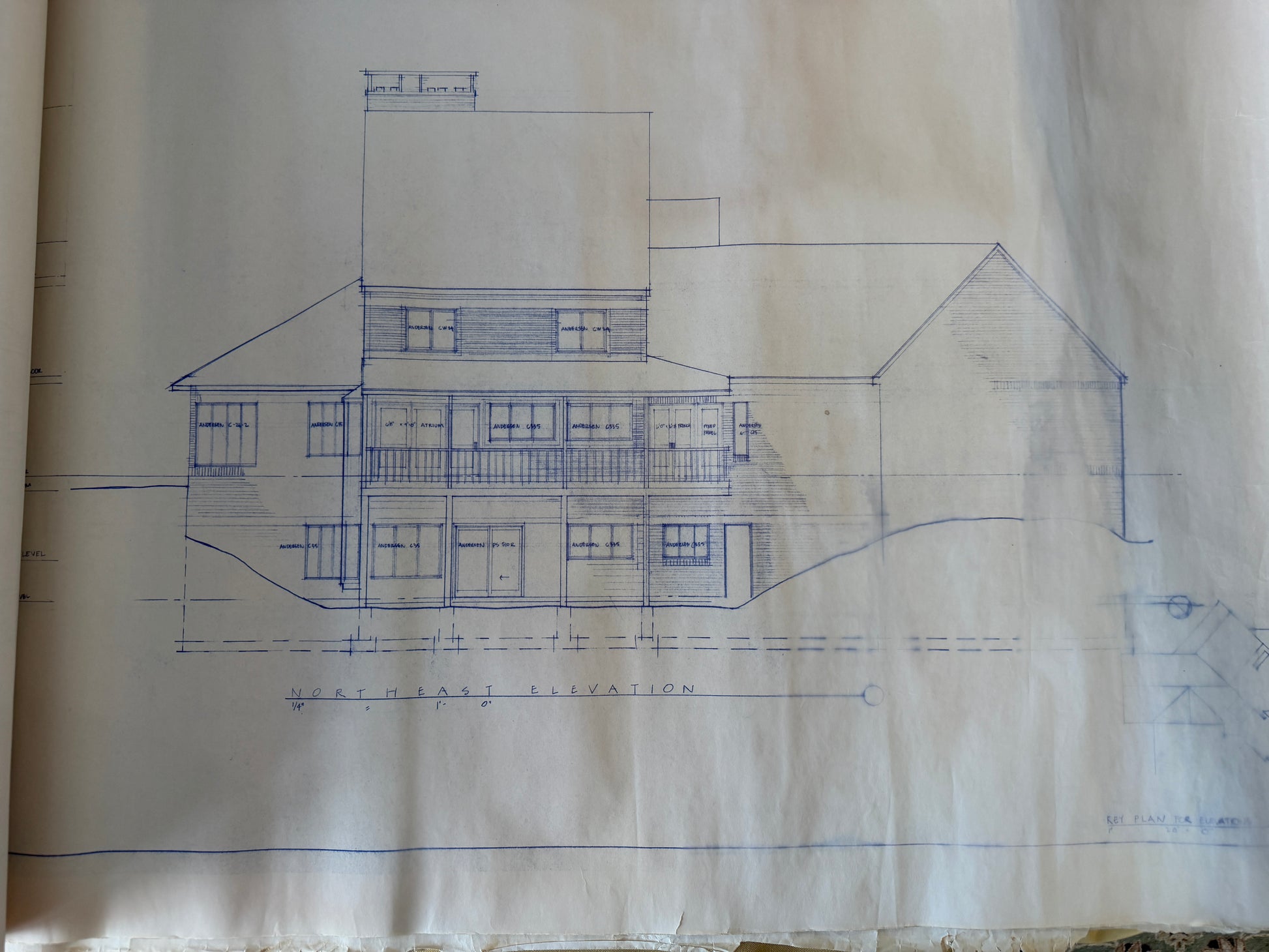 Blueprint of a house on a textured paper background