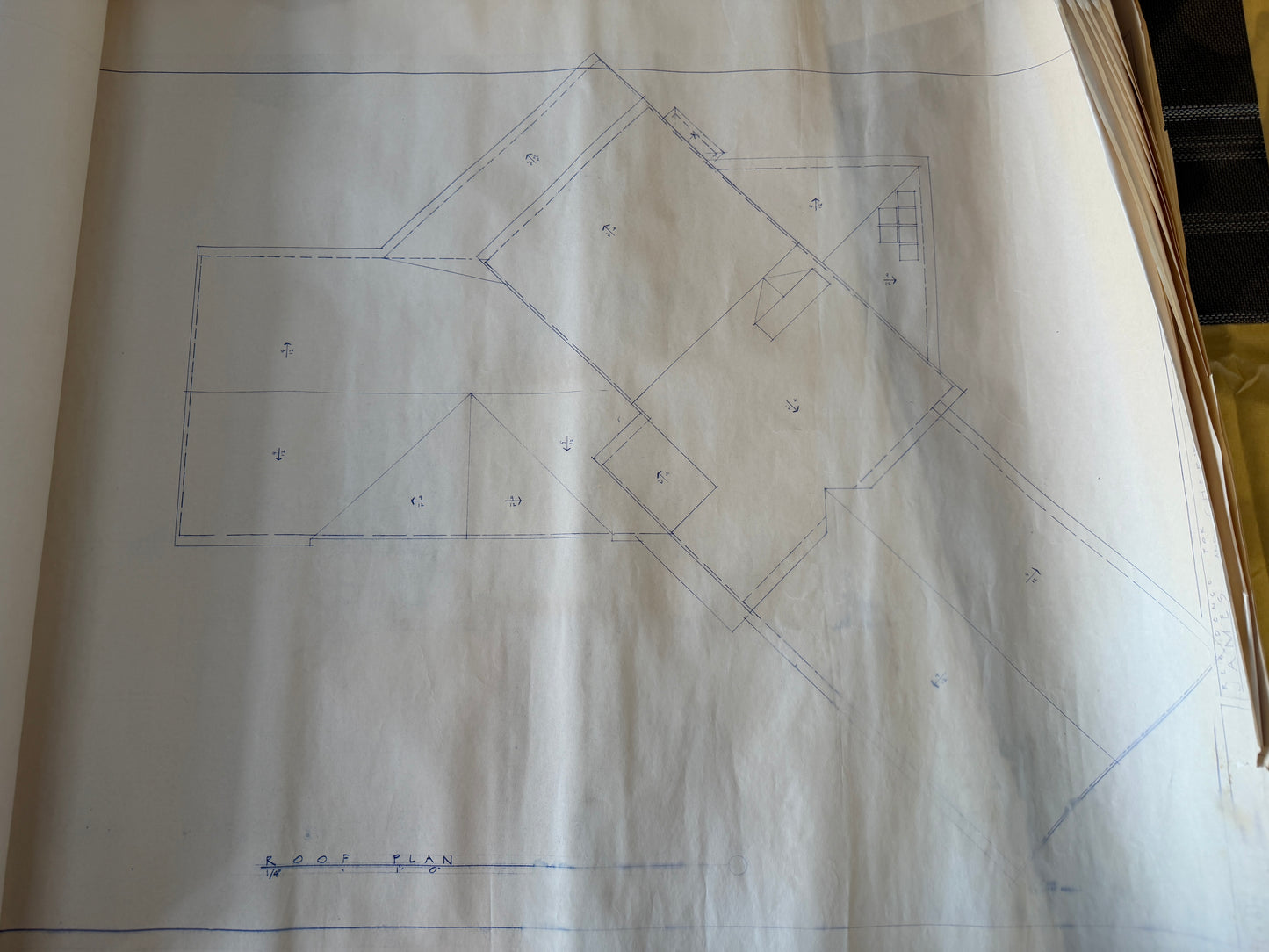 Technical drawing on paper with geometric shapes and measurements