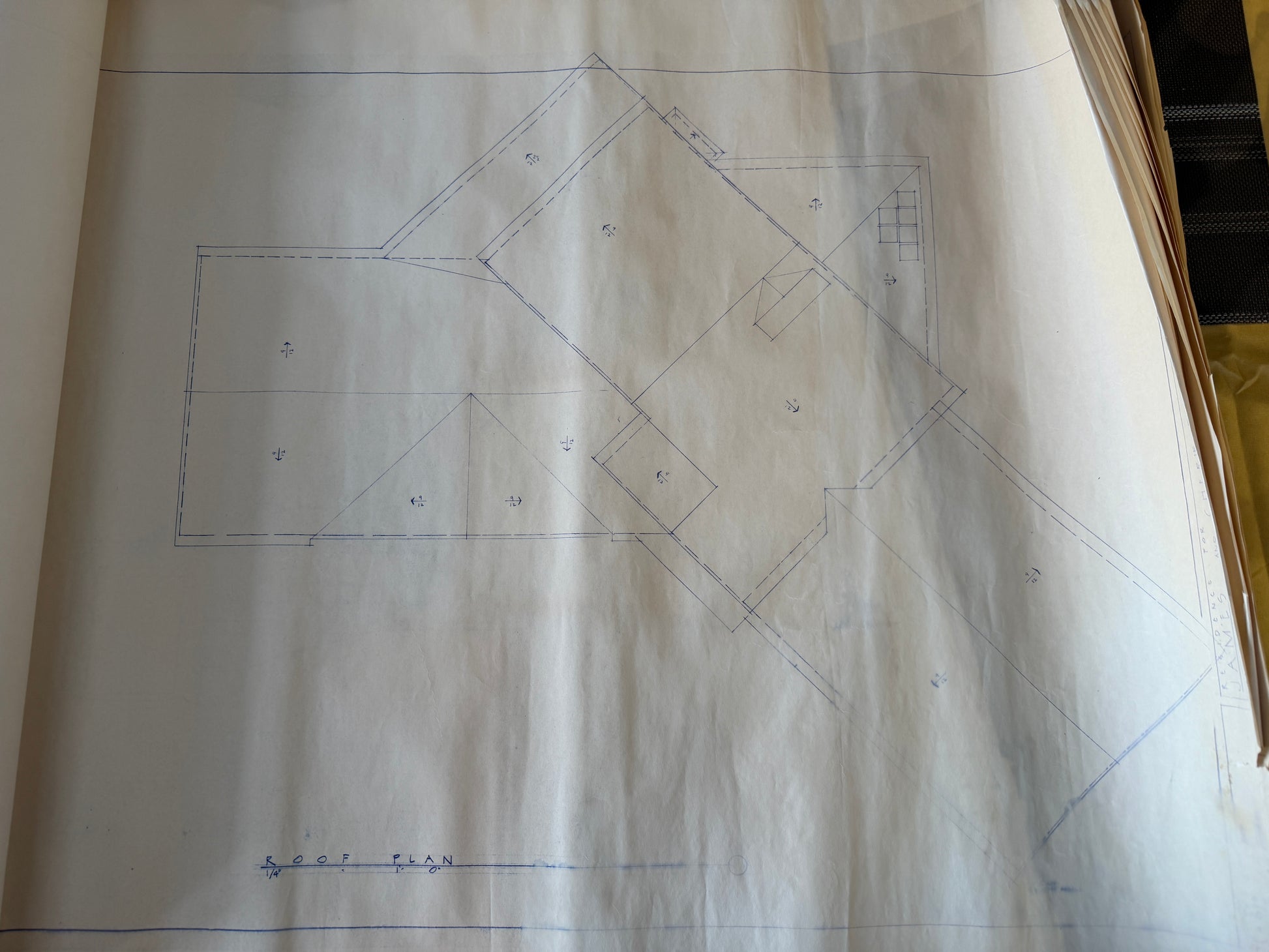 Technical drawing on paper with geometric shapes and measurements