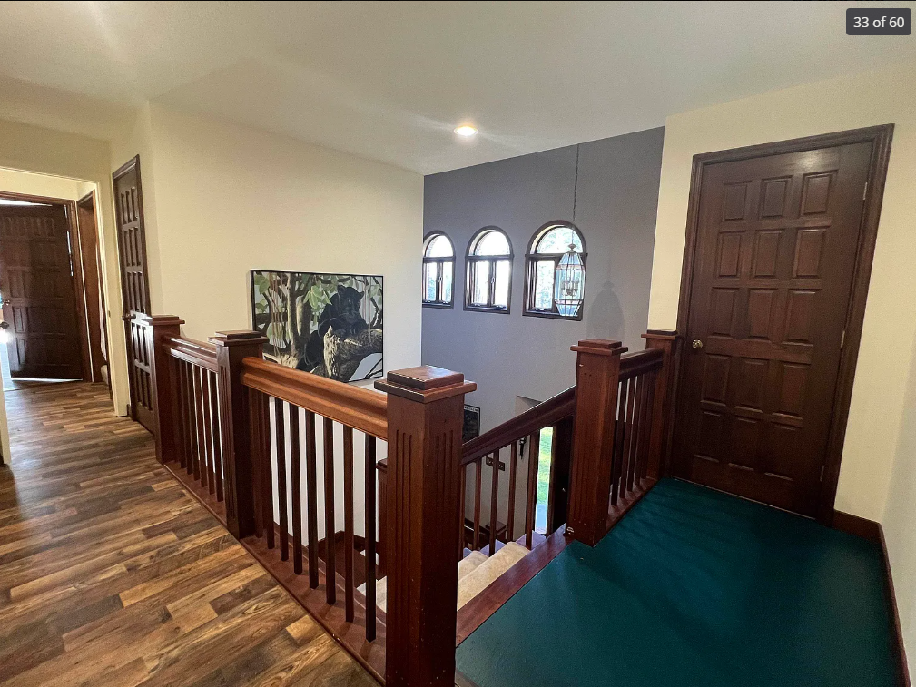 Staircase with wooden railings in a home interior