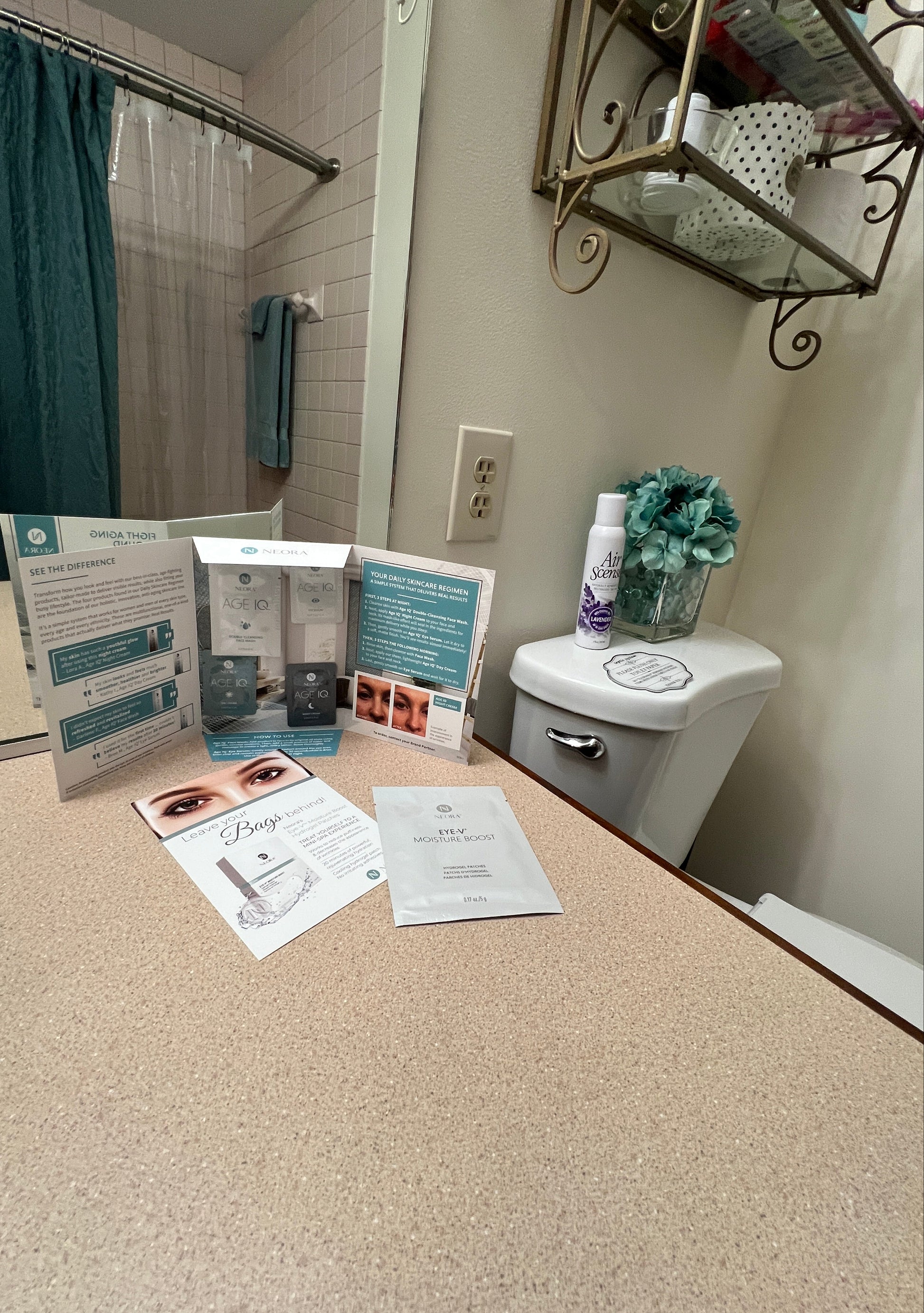 Bathroom with a sink, mirror, and various items on the counter.