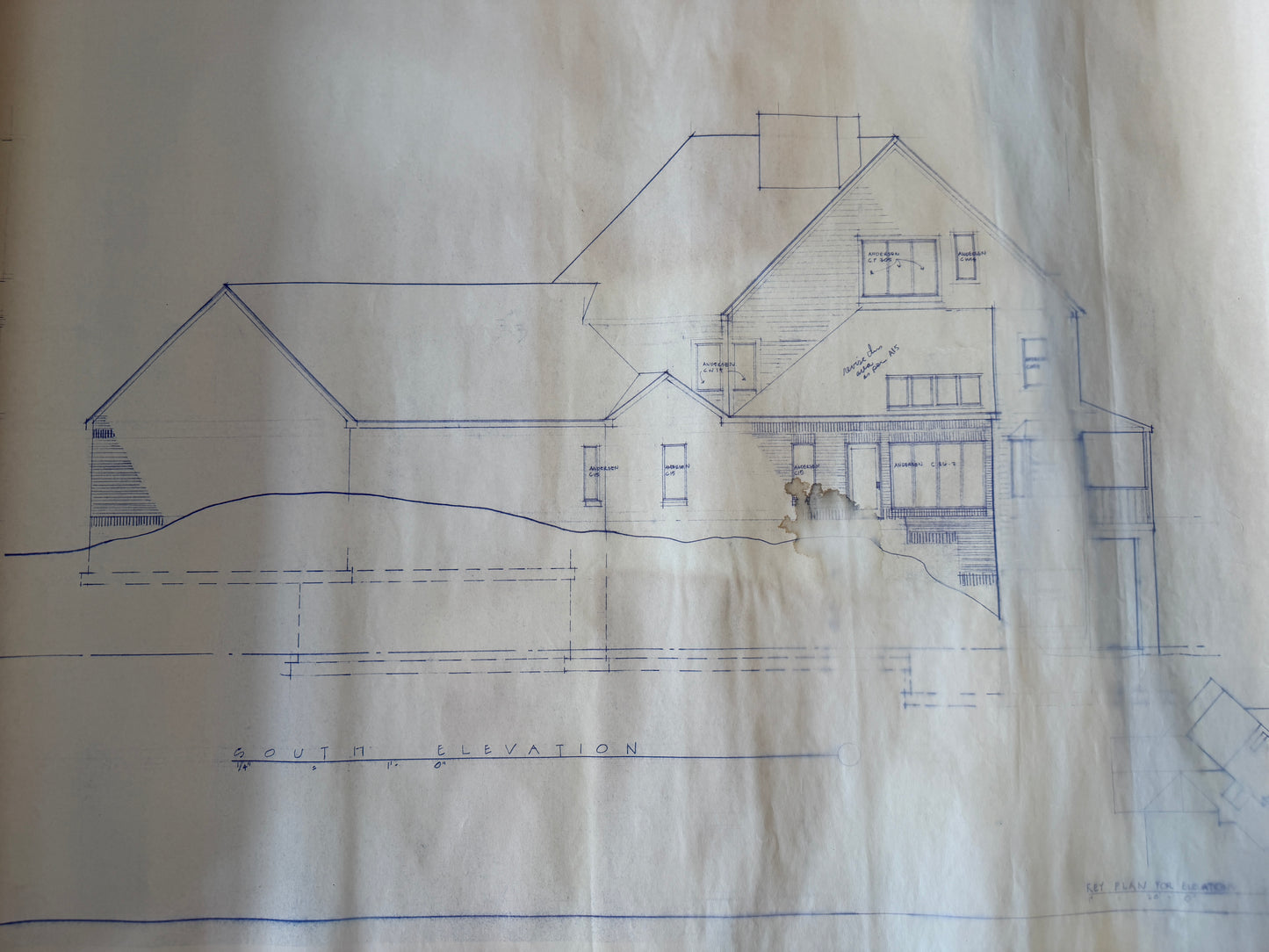Blueprint of a house on a textured paper background