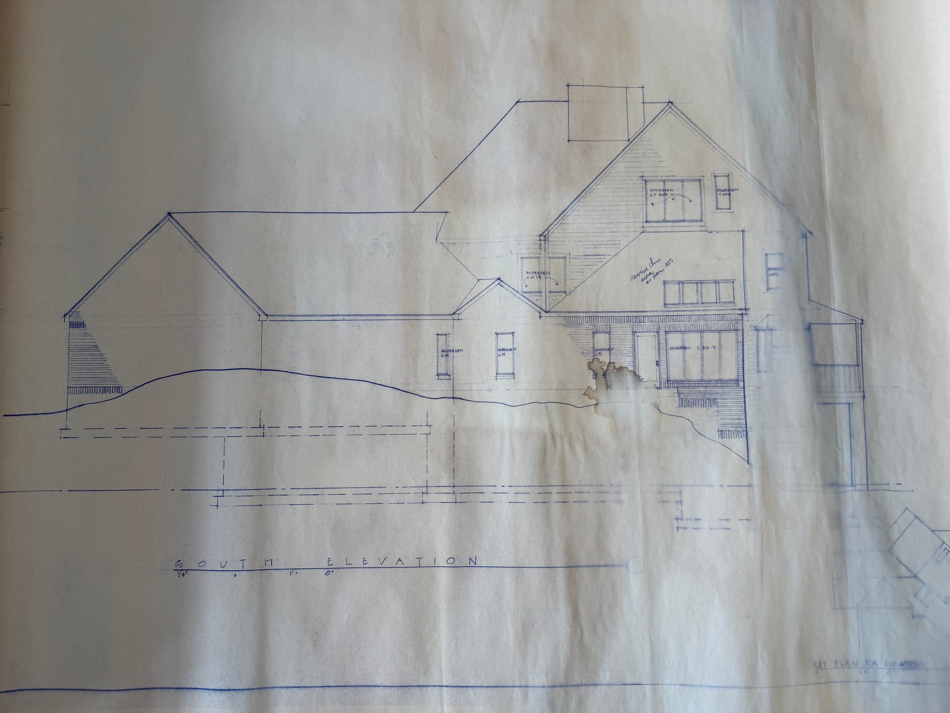 Blueprint of a house on a textured paper background