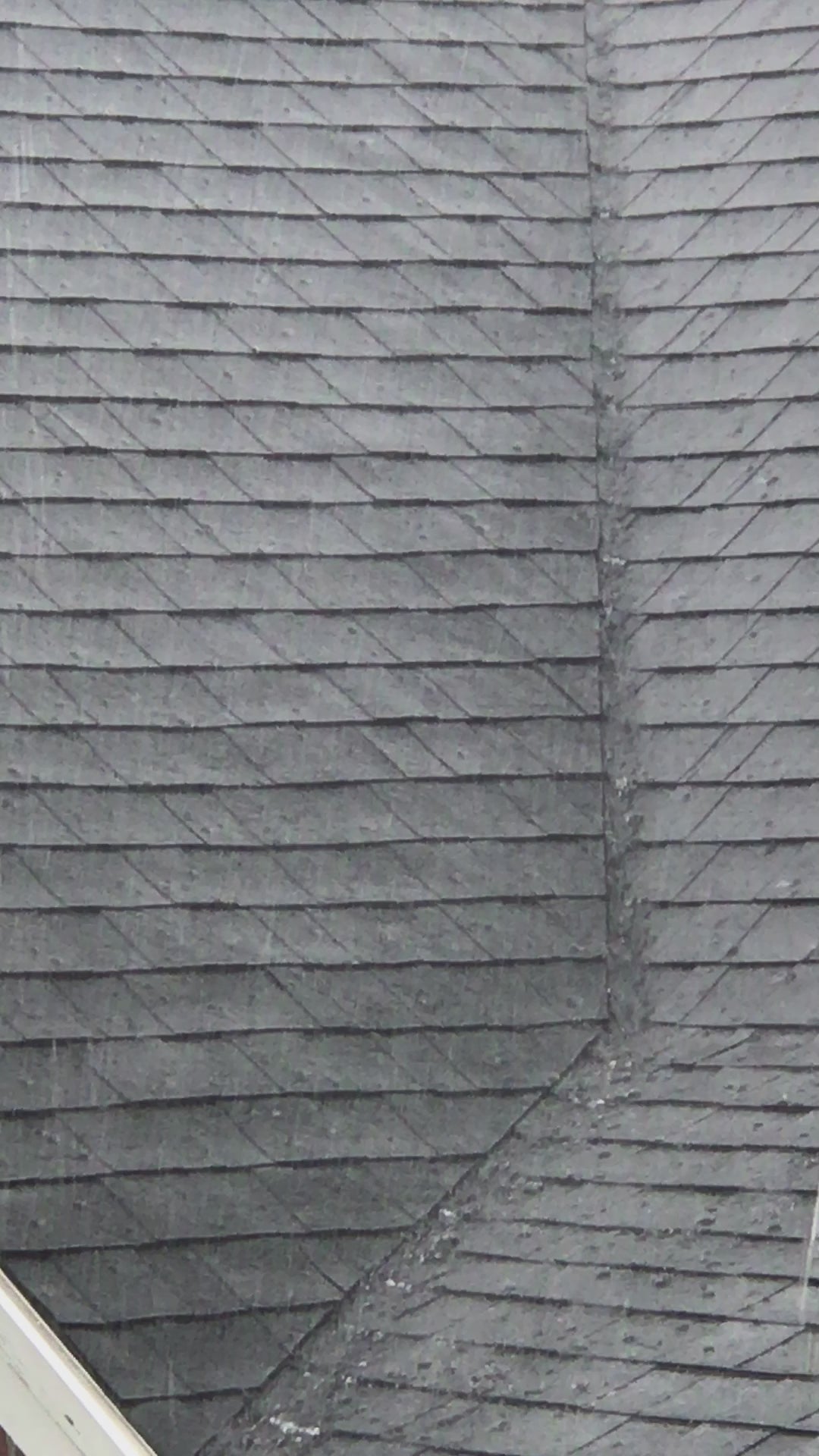 water running over new roofing 